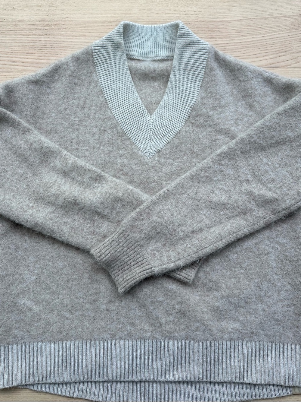 lululemon wool & alpaca Women's V-Neck Sweater in light beige/ cream